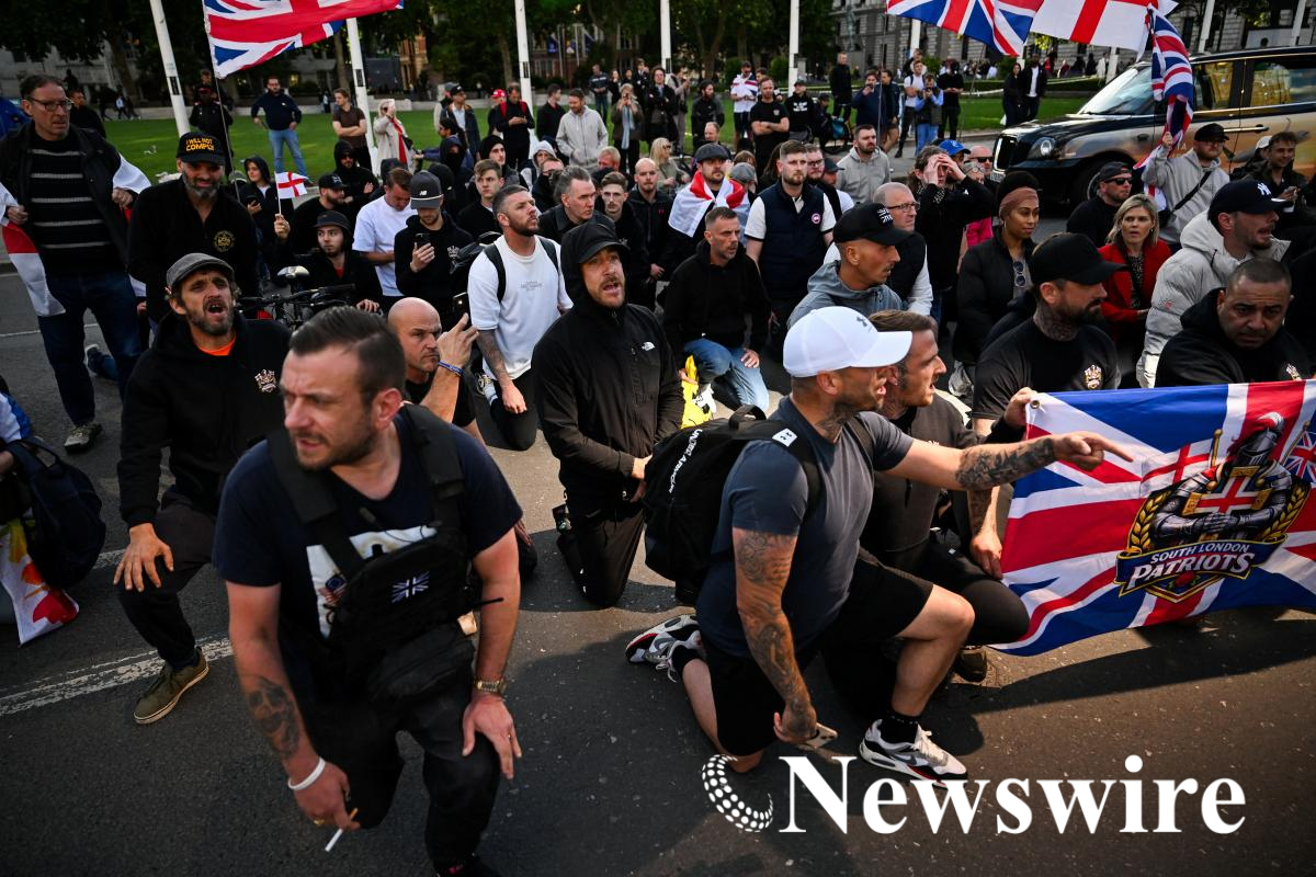 2026-06-09T185430Z_1526875590_RC2IQLA3SO3X_RTRMADP_3_NIRELAND-STABBING-LONDON-PROTEST.JPG